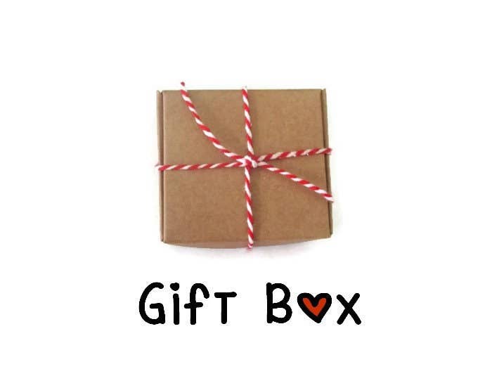 Mutter/Tochter-Ohrringe mit rosa Blumen auf schwarzem Hintergrund: Français