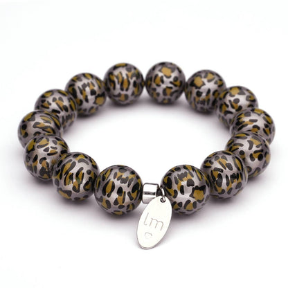 LizzyMae elastisches Leo-Perlenarmband mit Anhänger | Animal Print Statement Armband